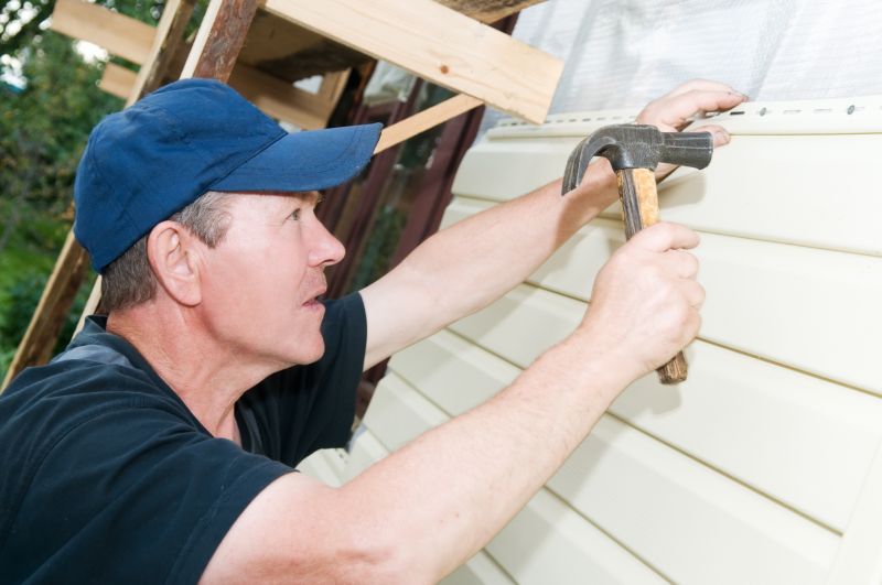 Local Vinyl Siding Repair pros at work